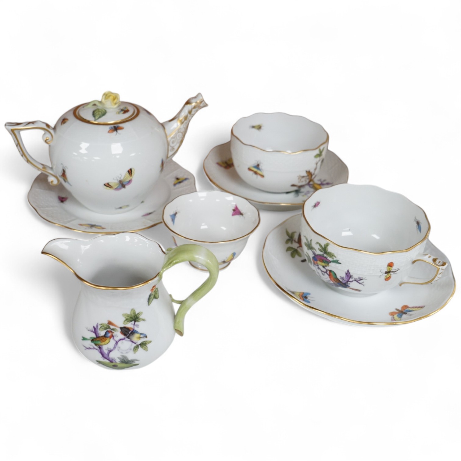 A Herend porcelain Rothschild Birds pattern tête-à-tête tea service, decorated with birds and butterflies. (8 piece's) teapot 10cm high